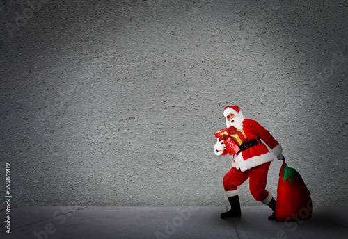 Photo: Christmas Santa with gifts. Christmas Santa with gifts.