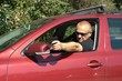 assassin shooting from a moving car, aggressive driver assassin shooting from a moving car, aggressive driver