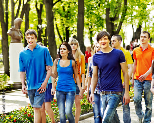 Photo: Group people in summer outdoor. Group people in summer outdoor.