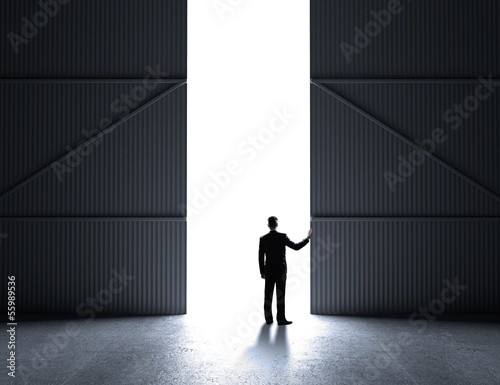 Photo: businessman open doors businessman open doors