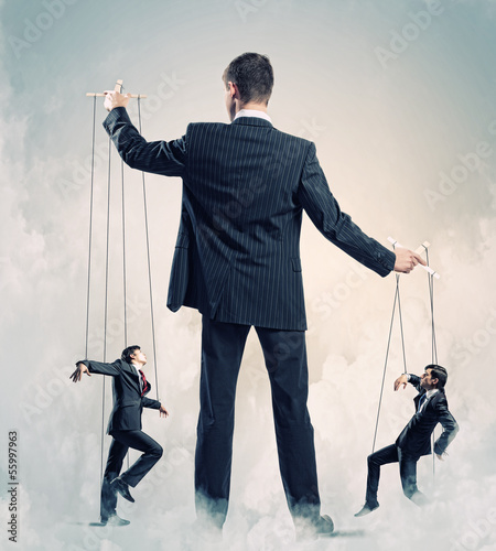 Photo: Businessman puppeteer Businessman puppeteer