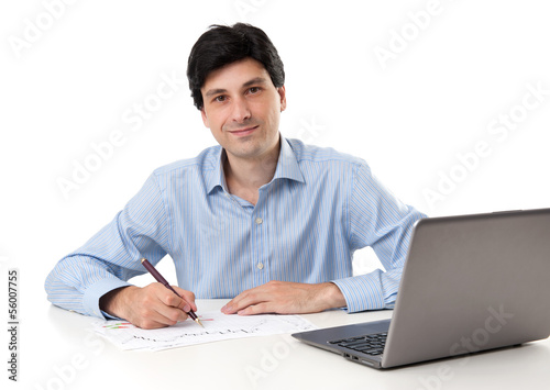 Photo: businessman working on his laptop businessman working on his laptop
