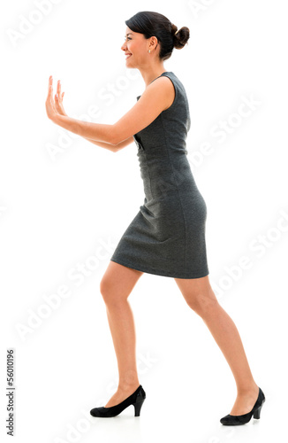 Photo: Business woman pushing Business woman pushing