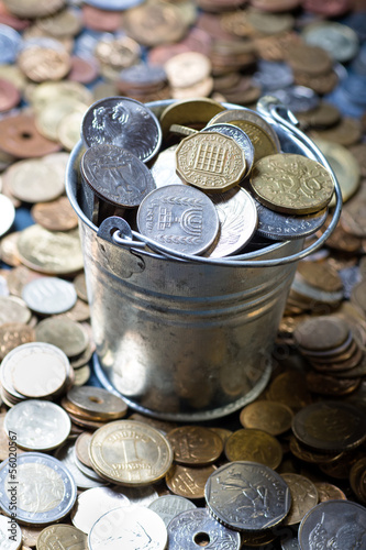 Photo: Pail of world coins Pail of world coins