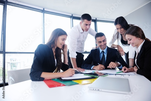 Photo: business people in a meeting at office business people in a meeting at office