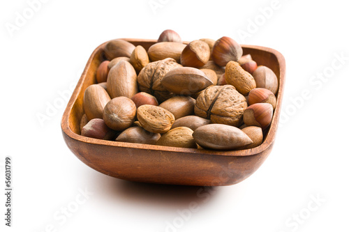 Photo: various unpeeled nuts in wooden bowl various unpeeled nuts in wooden bowl