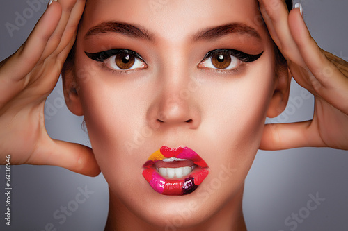 Photo: Beautiful woman with fashion makeup Beautiful woman with fashion makeup