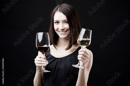 Photo: woman holding wine glass woman holding wine glass
