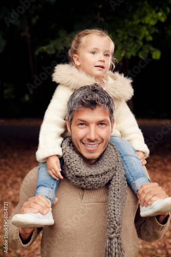 Photo: family father autumn walk with child family father autumn walk with child