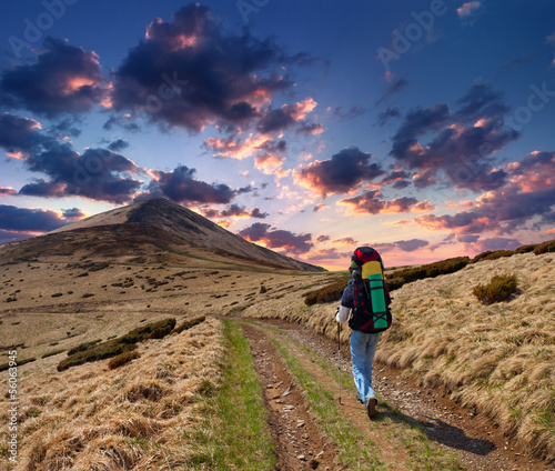 Photo: sportive man on the mountain trek sportive man on the mountain trek