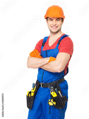 Photo: Portrait of smiling handyman with tools Portrait of smiling handyman with tools