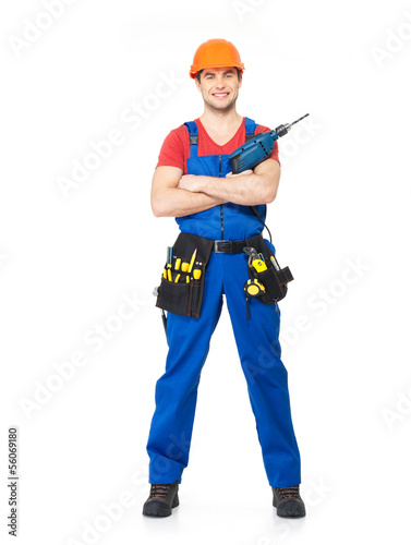 Photo: Handyman with tools full portrait isolated Handyman with tools full portrait isolated