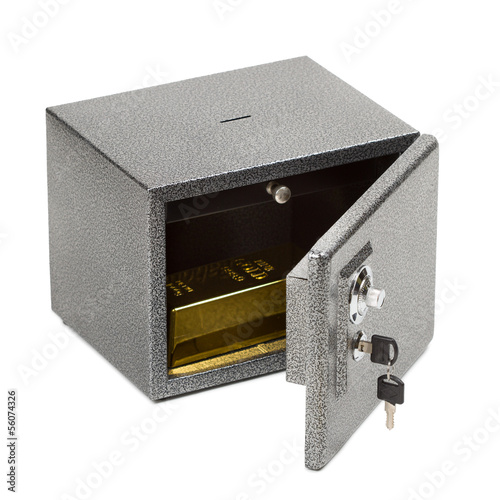 Photo: Opened safe with golden piece inside. Isolated on white. Opened safe with golden piece inside. Isolated on white.