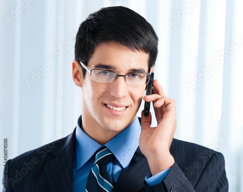 Photo: Businessman with cellphone Businessman with cellphone