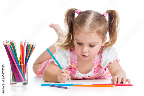 Photo: cute child drawing with colorful pencils cute child drawing with colorful pencils