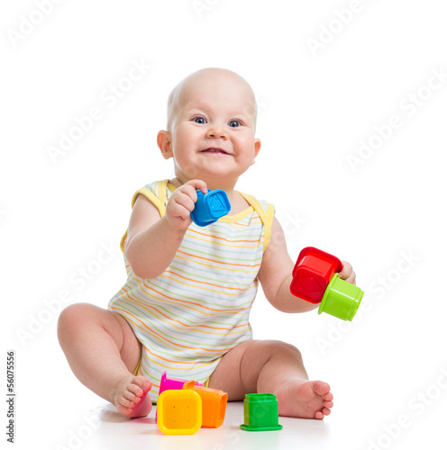 Photo: baby boy playing with cup toys baby boy playing with cup toys