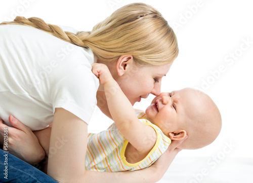 Photo: happy mother having fun with her baby boy infant happy mother having fun with her baby boy infant