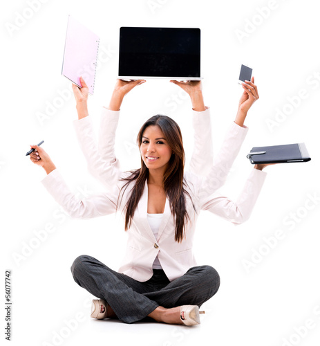 Photo: Business woman multitasking Business woman multitasking