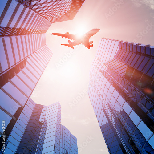 Illustration: Airplane above city Airplane above city