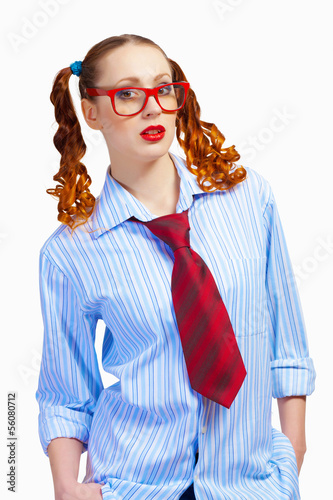 Photo: Teenager girl in red glasses Teenager girl in red glasses