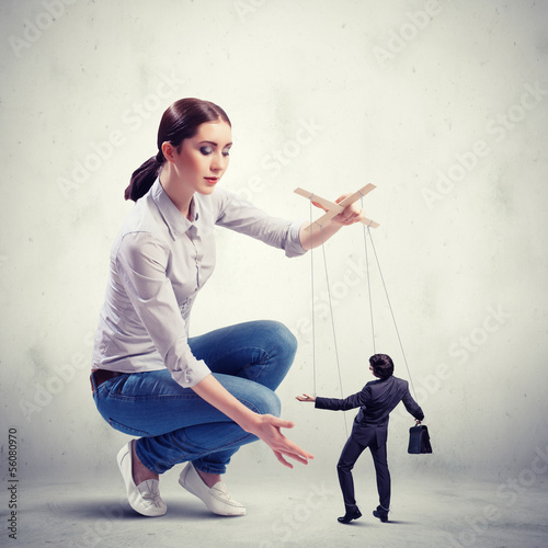 Photo: Businesswoman puppeteer Businesswoman puppeteer