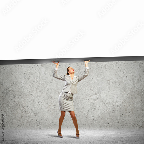 Photo: Businesswoman with banner Businesswoman with banner