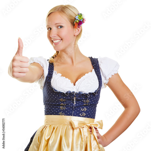 Photo: Woman in a dirndl holding thumbs up Woman in a dirndl holding thumbs up