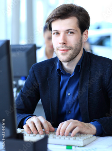 Photo: Businessman using laptop Businessman using laptop