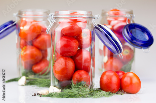 Photo: Fresh tomatoes in a glass jar Fresh tomatoes in a glass jar