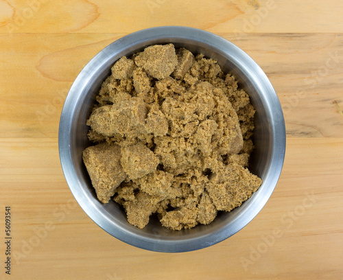 Photo: Dark brown sugar in stainless steel bowl Dark brown sugar in stainless steel bowl
