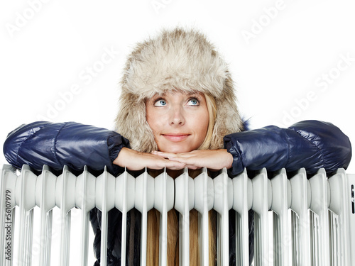 Photo: Winter lady with cap and radiator Winter lady with cap and radiator