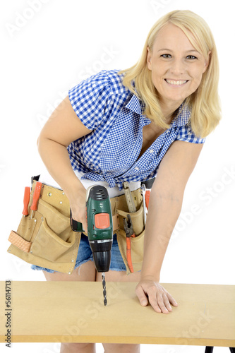 Photo: Weiblicher Handwerker mit Bohrmaschine Weiblicher Handwerker mit Bohrmaschine
