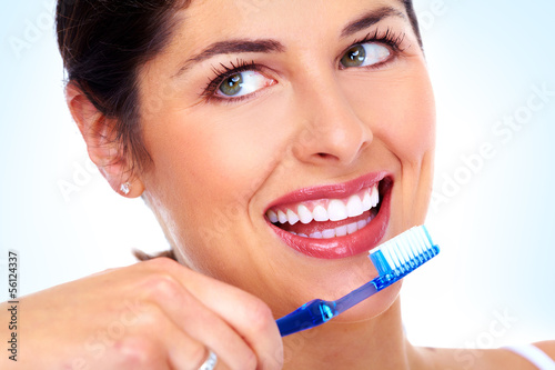 Photo: Beautiful woman with toothbrush. Beautiful woman with toothbrush.