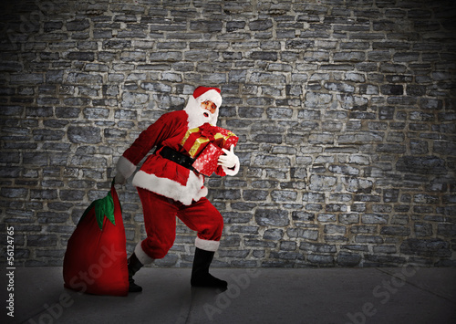 Photo: Christmas Santa with gifts. Christmas Santa with gifts.
