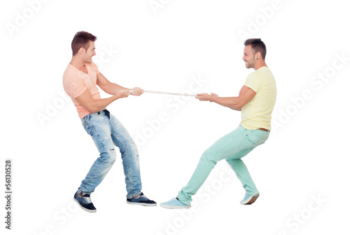 Photo: Two boys pulling a rope Two boys pulling a rope