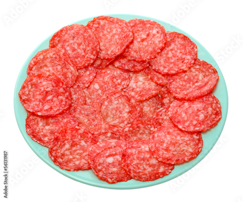 Photo: tasty sausage on plate, isolated on white tasty sausage on plate, isolated on white