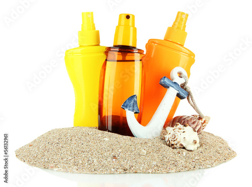Photo: Bottles with suntan cream, isolated on white Bottles with suntan cream, isolated on white