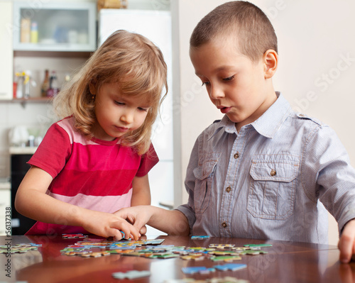 Photo: Children, playing puzzles Children, playing puzzles