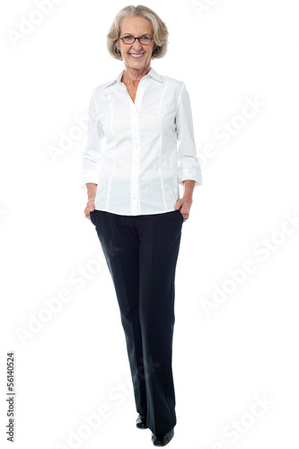Photo: Aged woman in corporate attire Aged woman in corporate attire