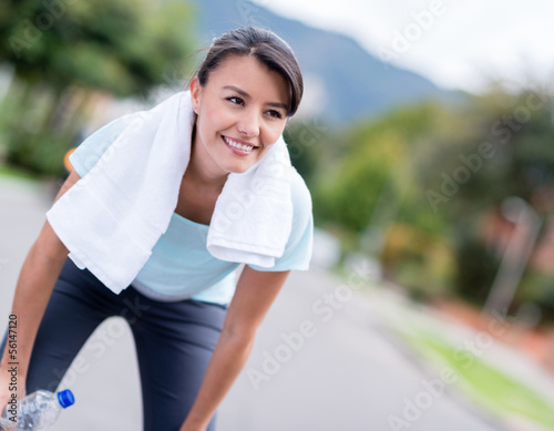 Photo: Woman resting while running Woman resting while running