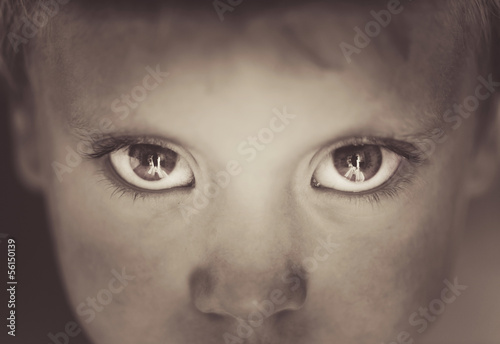 Photo: Eyes close-up little boy Eyes close-up little boy