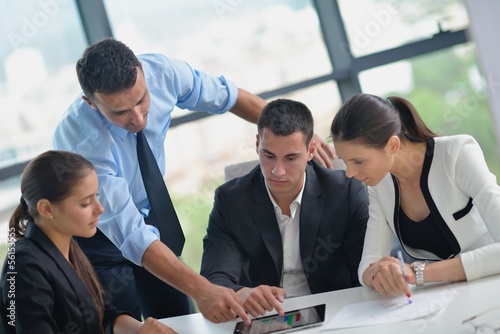 Photo: business people in a meeting at office business people in a meeting at office