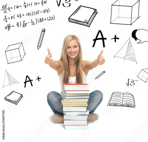 Photo: student with stack of books student with stack of books