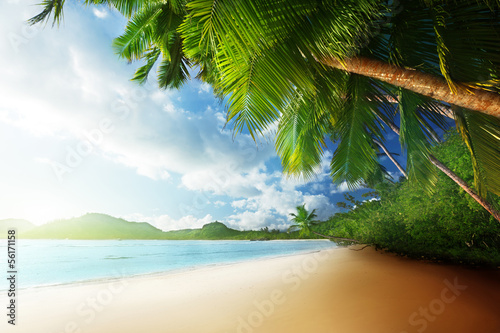 Photo: sunset on beach Anse Takamaka of Mahe island, seychelles sunset on beach Anse Takamaka of Mahe island, seychelles