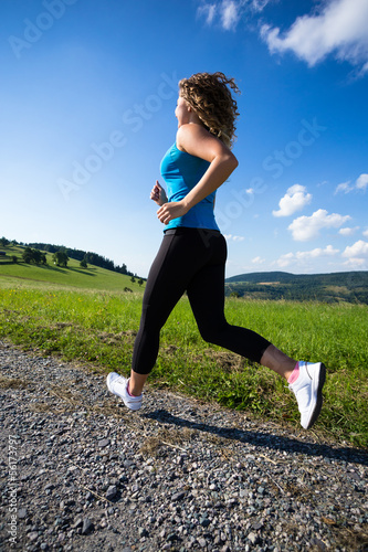 Photo: Woman running outdoor Woman running outdoor