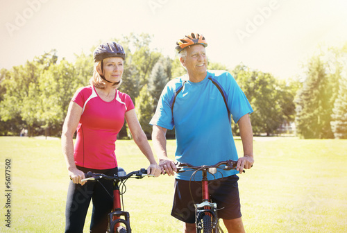 Photo: Old people with bycicle Old people with bycicle