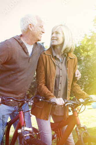 Photo: Old people with bycicle Old people with bycicle