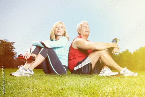 Photo: Old people over park background Old people over park background