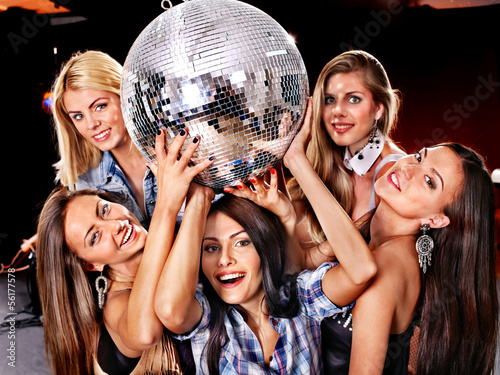 Photo: Woman on disco in night club. Woman on disco in night club.
