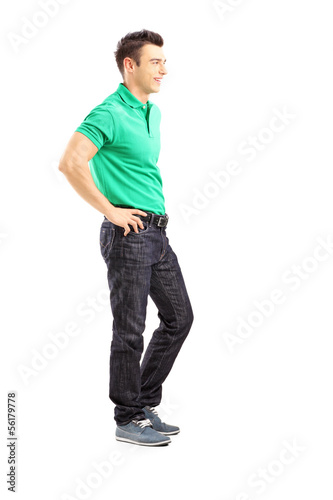 Photo: Full length portrait of a handsome casual man posing Full length portrait of a handsome casual man posing